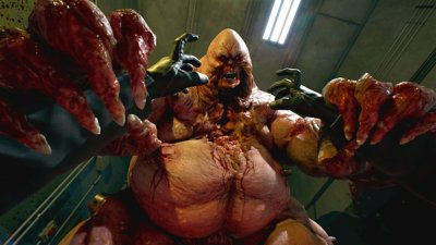Killing Floor 3 screenshot showing a zed grabbing the player in first person