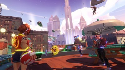 Knockout City - Captura de pantalla que muestra a los jugadores frente a un paisaje urbano